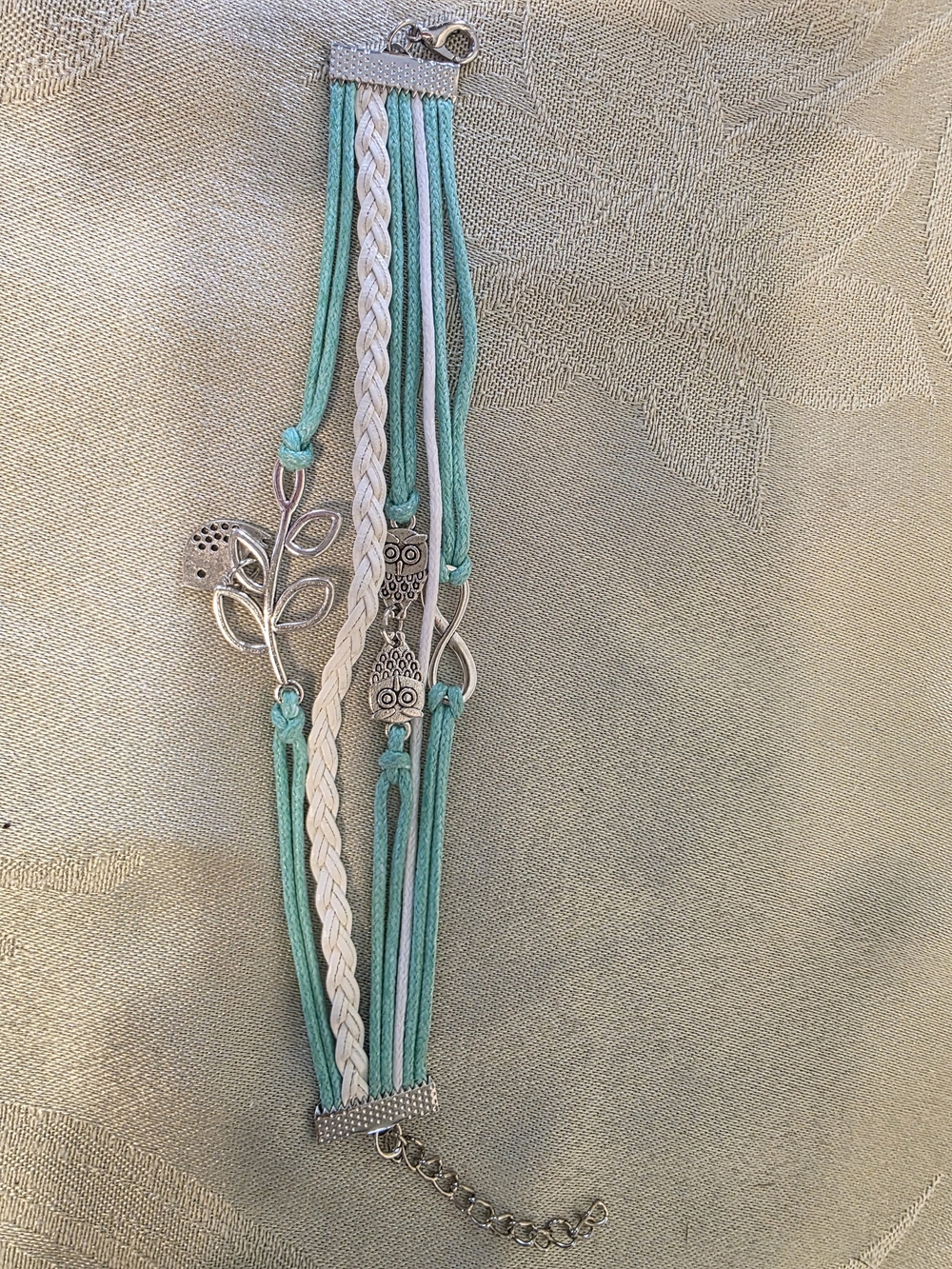 Multi-Strand Turquoise & White Charm Bracelet with Owl and Leaf Accents